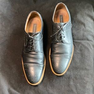 Gordon Rush, Men’s black leather, cap toe shoe.
